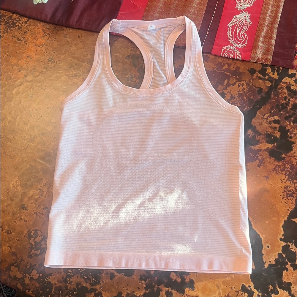 Lululemon Swiftly Tech Racerback Tank Top. Race length, size 4.